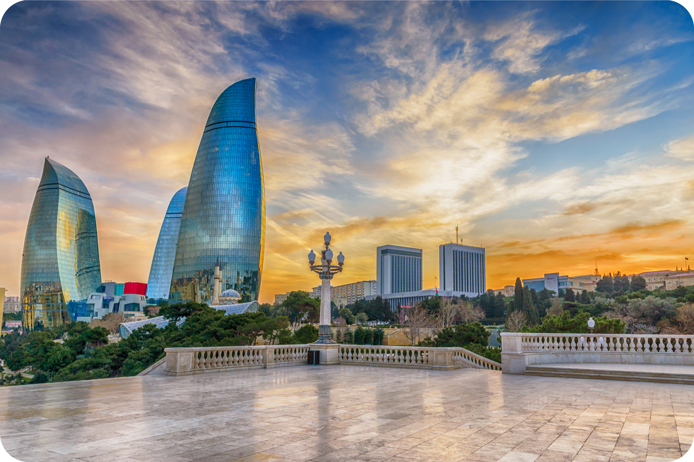 Baku skyline at night with the Flame Towers and Caspian Sea waterfront